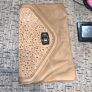 Aldo tan clutch purse.